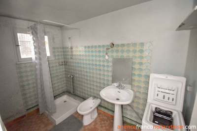 Investment 3-bed town house and 1/2 acre