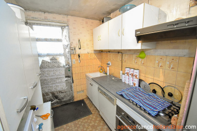 Investment 3-bed town house and 1/2 acre