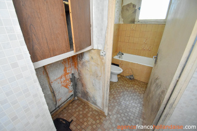 Investment 3-bed town house and 1/2 acre