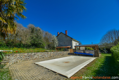 House with barns, swimming pool and close to 4 acres