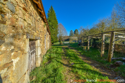 At the top of the hill with no close neighbours