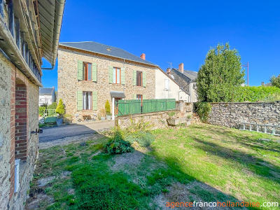 Village stone house with barn and land