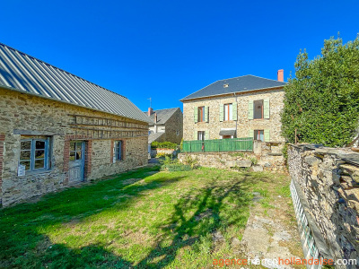 Village stone house with barn and land